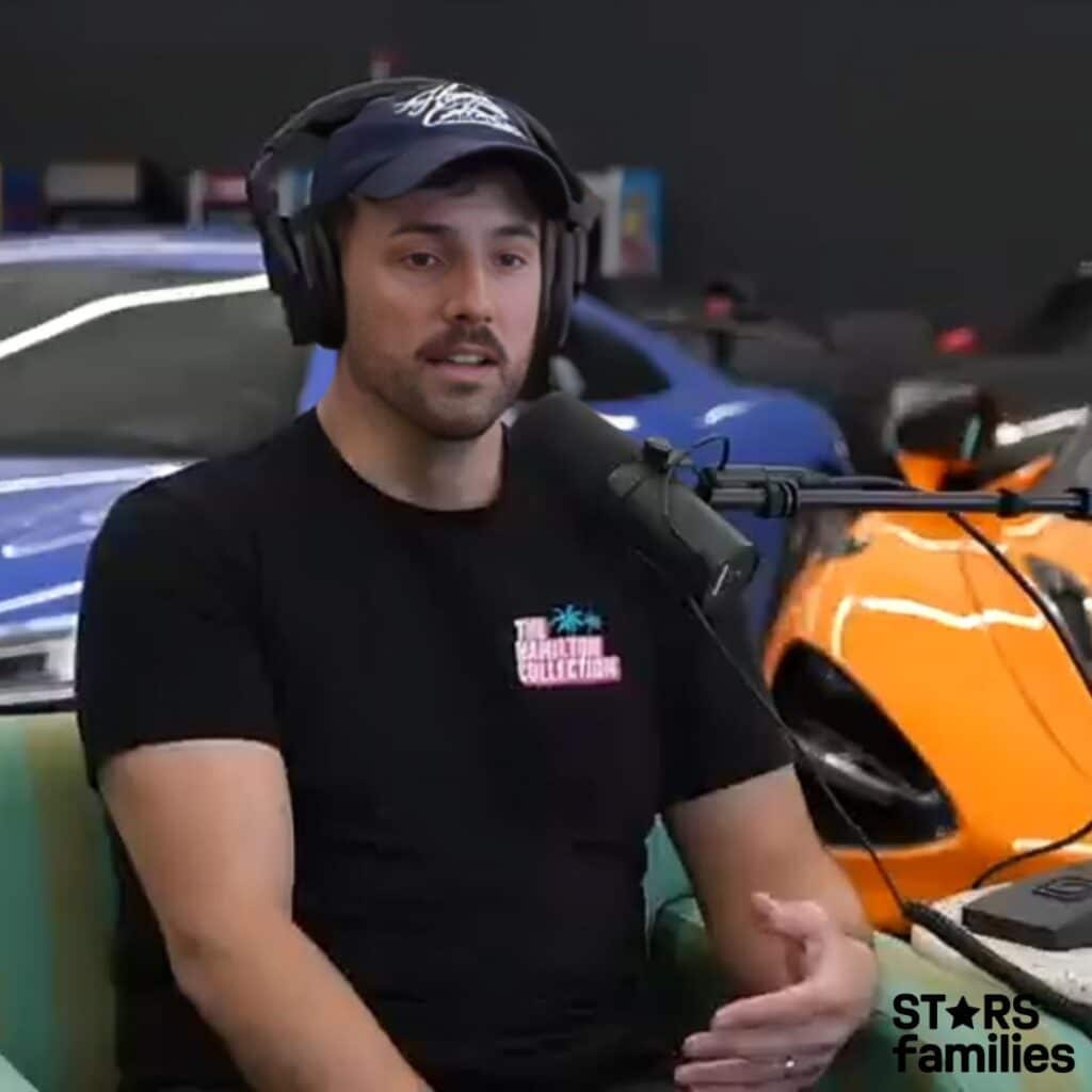 Frank Siller, wearing a black t-shirt with "THE CARLITO COLLECTION" written on it, sits in front of a microphone, wearing headphones.